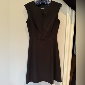 Tahari black dress with keyhole and neck detail.